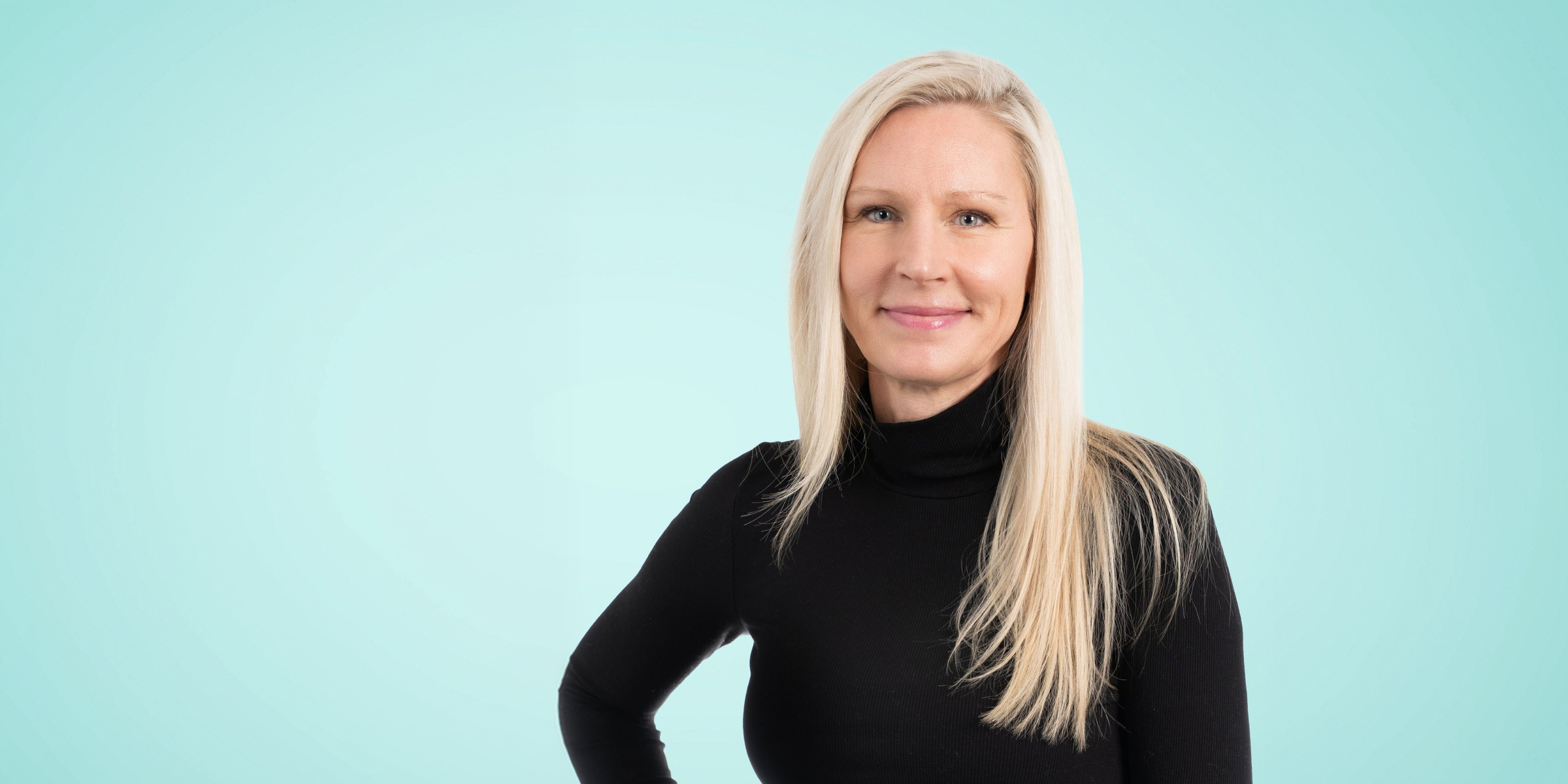 a picture of susan zwaal with her hand placed on her side